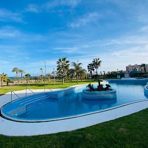 Precioso apartamento 1ª línea de playa con piscina